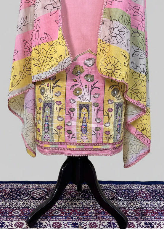 Colorful floral-patterned garment on a stand against a white background