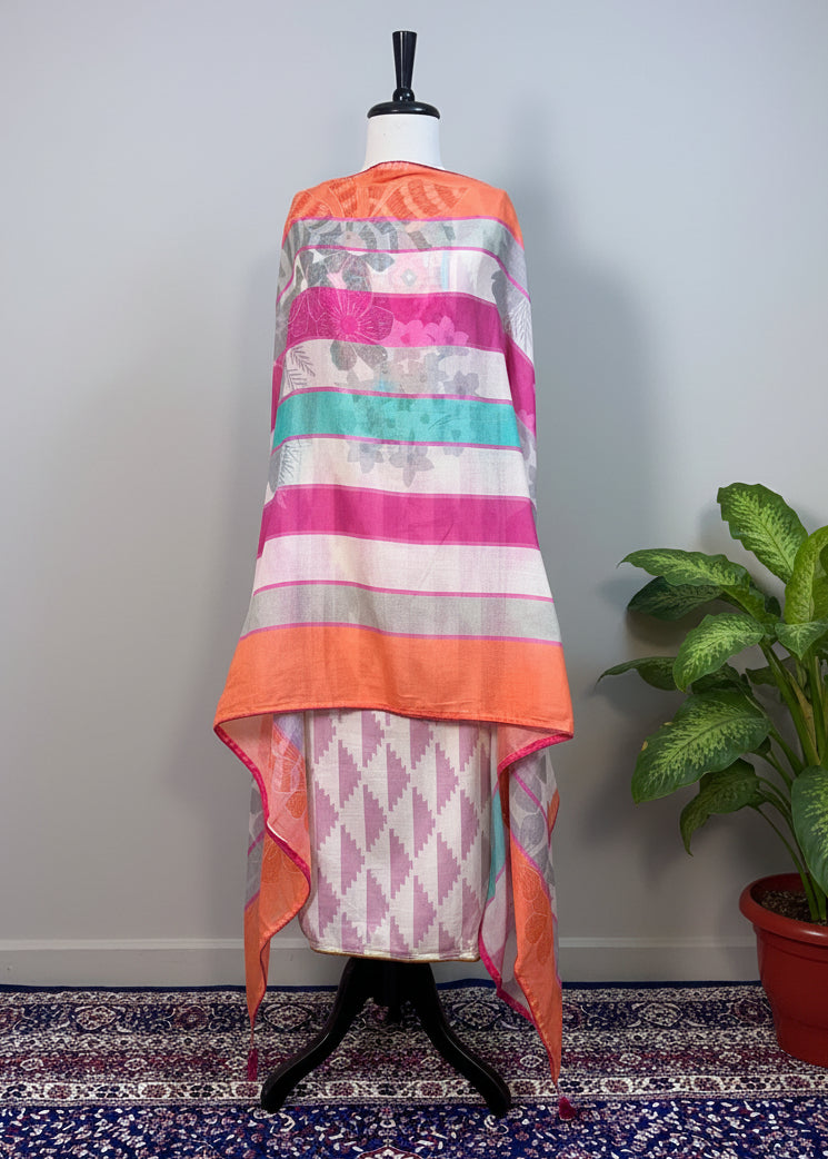 Colorful striped dress on a mannequin against a plain background